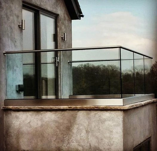 Bespoke made-to-measure Juliet balcony constructed using glass and stainless steel
