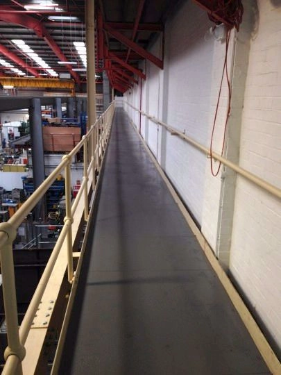 showing a full building length mezzanine walkway.