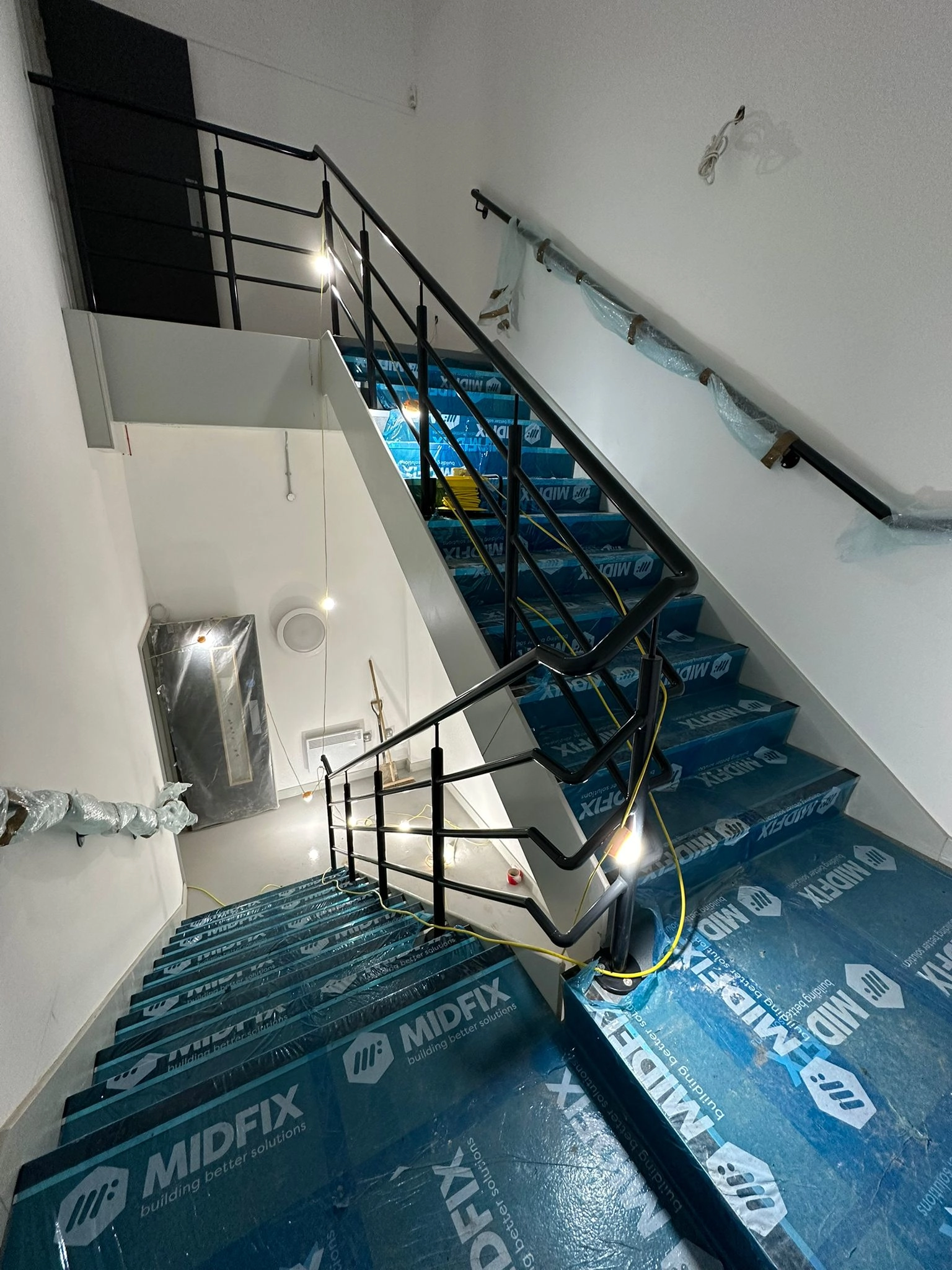 new black powered coated handrails installed in new apartment blocks.