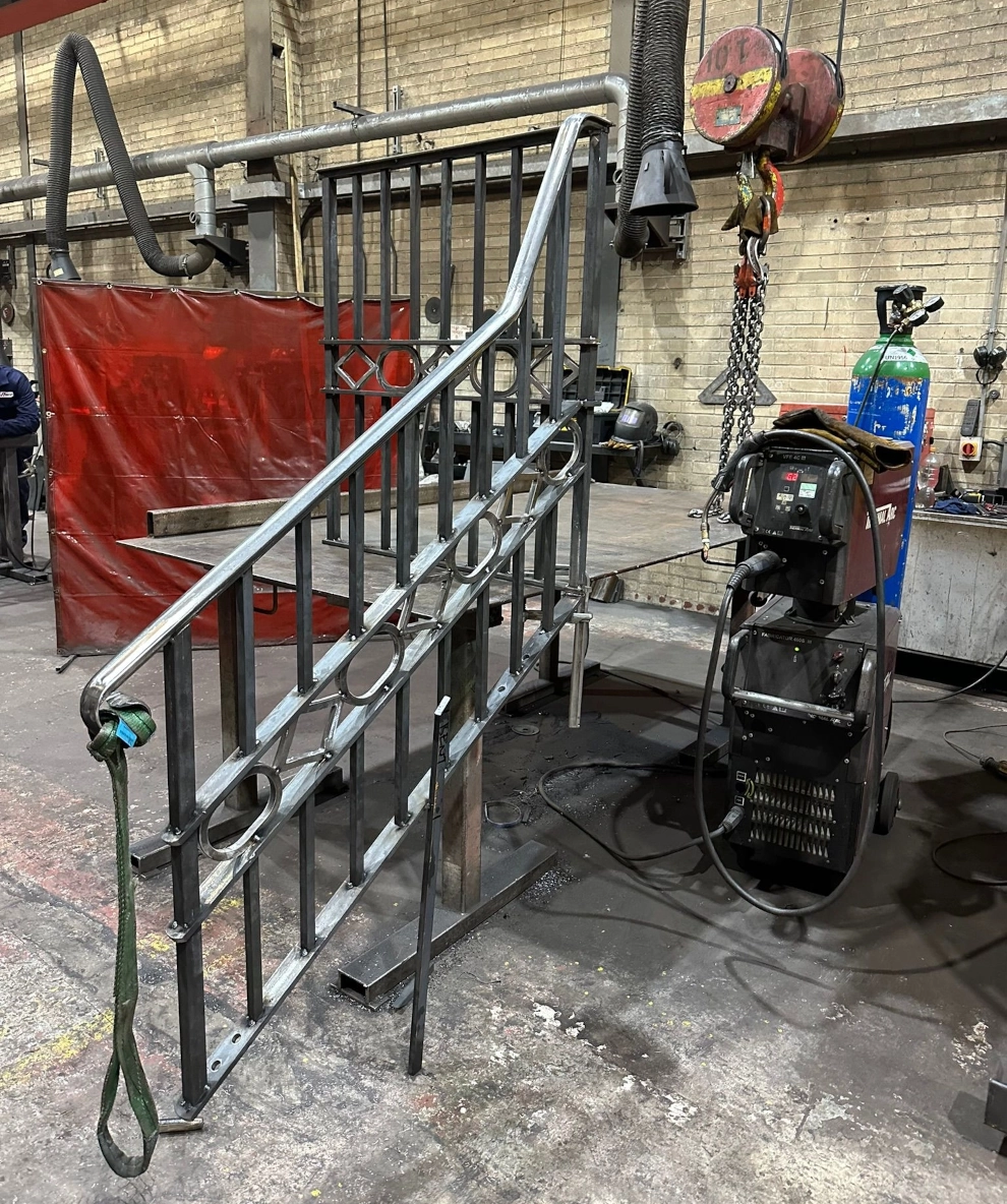 Steel fabricated hand rails in our workshop, before being power coated and installation.