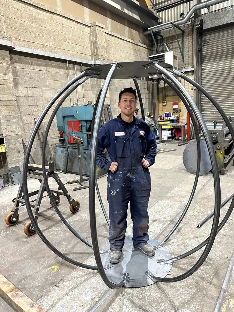 A bespoke one-of-a-kind steel globe sculpture fabricated for a client