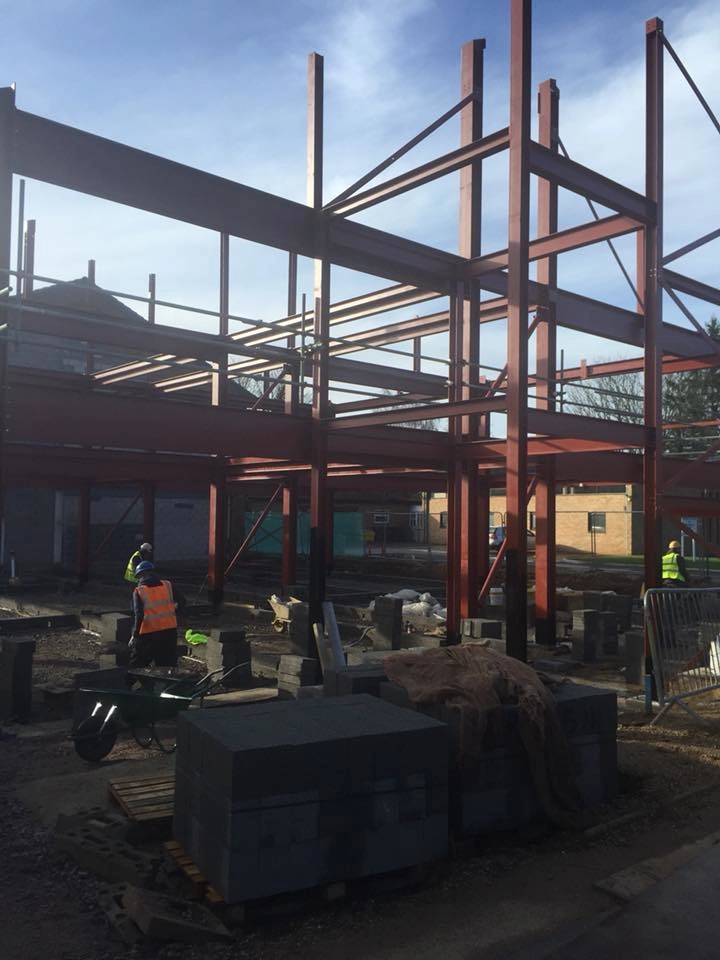 showing our workers on site at Oakham School, ready to start fabricating.